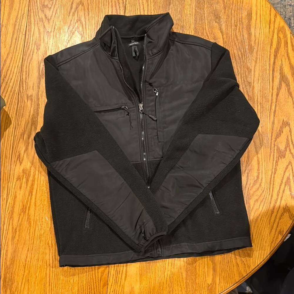 Black Performance Jacket with High Collar and Quilted Design